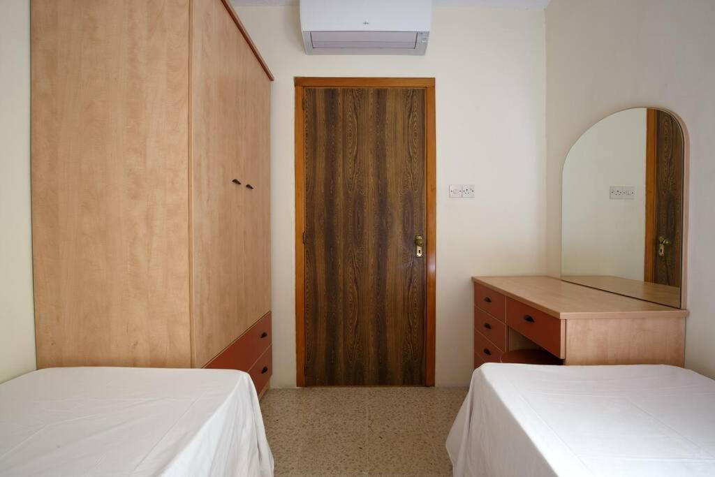 Giường trong phòng chung tại 3 Bedrm Apt Balluta Bay (1)
