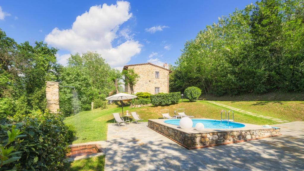 The swimming pool at or close to Ai Due Cuori 4, Emma Villas
