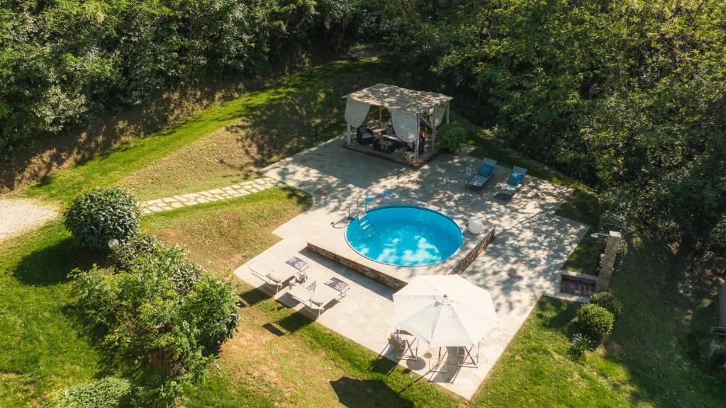 The swimming pool at or close to Ai Due Cuori 4, Emma Villas