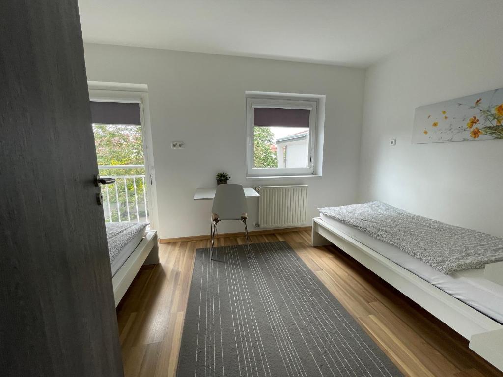 Posteľ alebo postele v izbe v ubytovaní Benevia Apartments