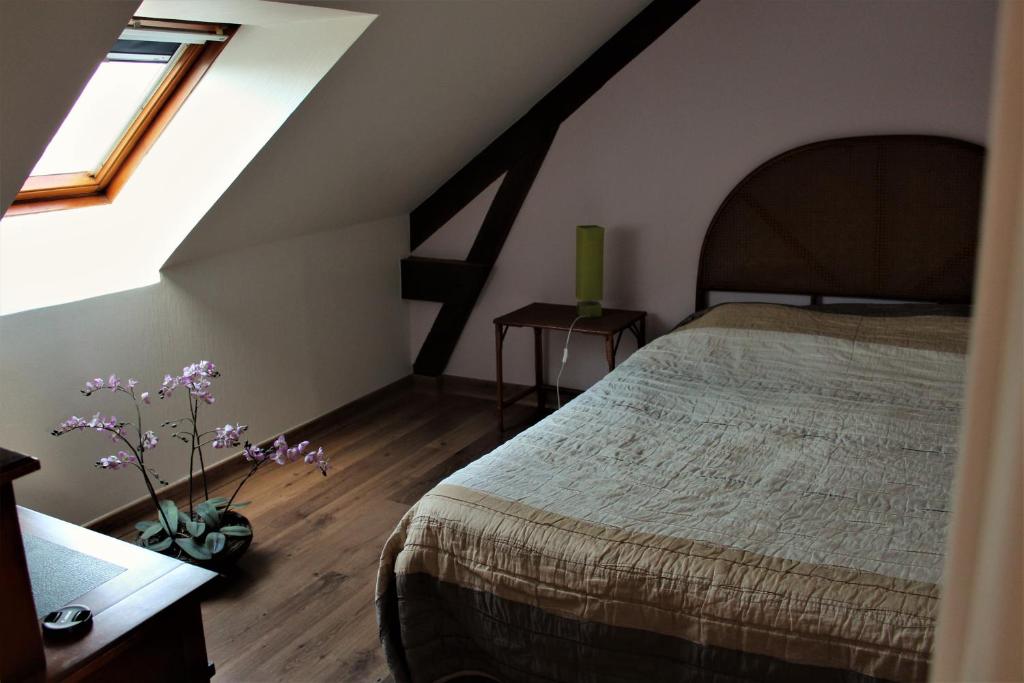 Postel nebo postele na pokoji v ubytování B&B La Gautraie