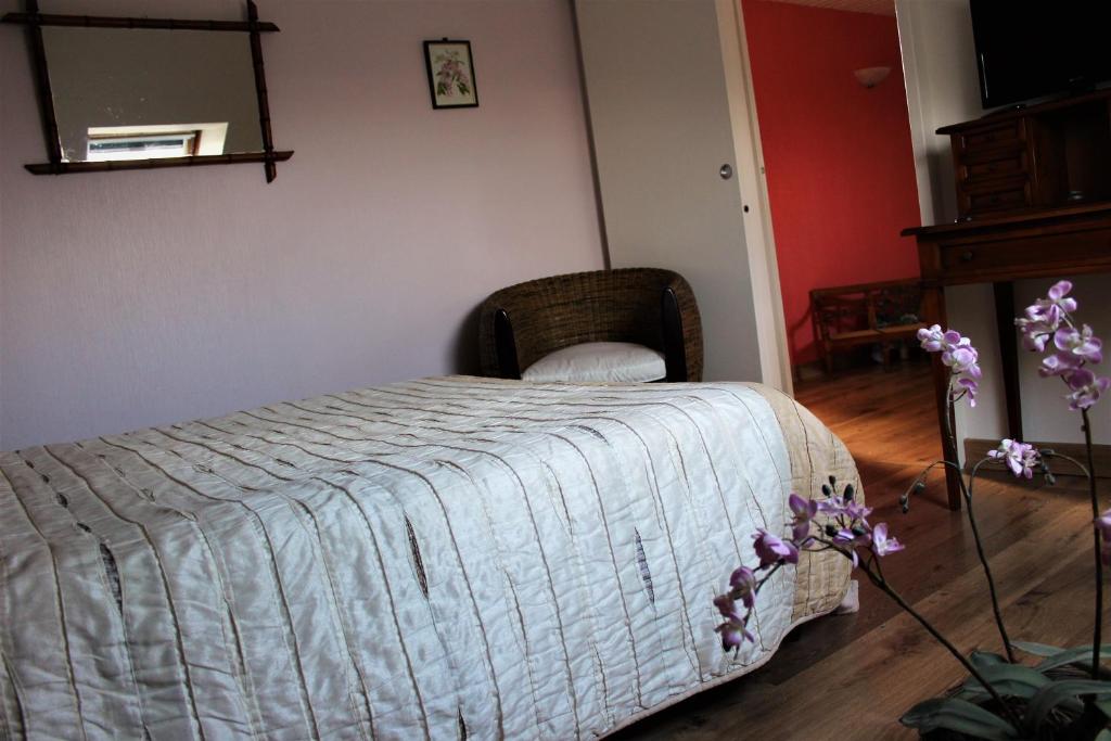 Postel nebo postele na pokoji v ubytování B&B La Gautraie
