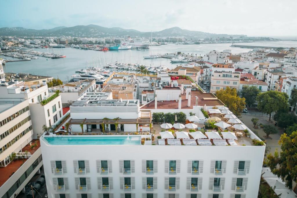 an aerial view of a city with a harbor at The Standard, Ibiza in Ibiza Town