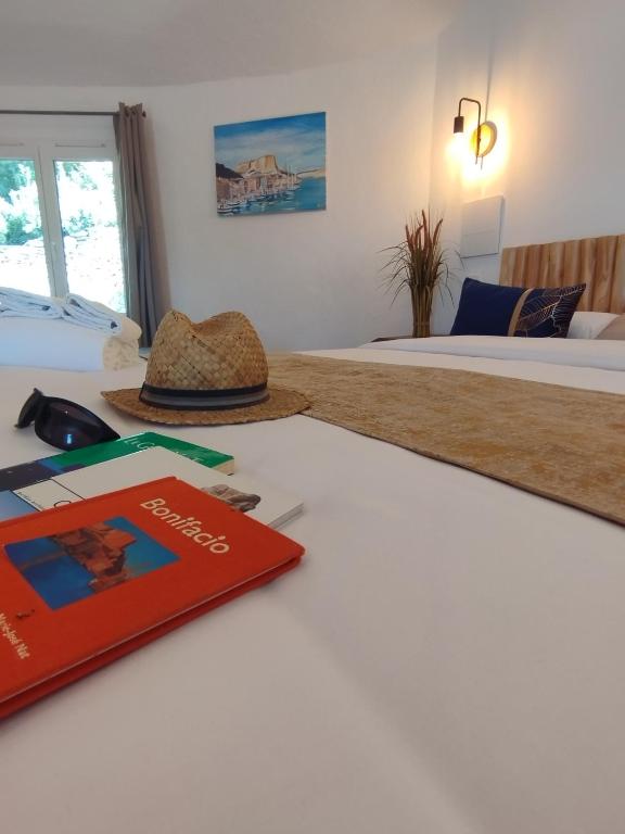 Postel nebo postele na pokoji v ubytování Hôtel Padolo