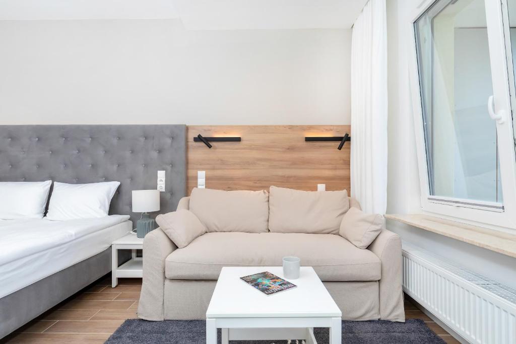 Posteľ alebo postele v izbe v ubytovaní Apartamenty Aquamarina Onyx by Noclegi Renters