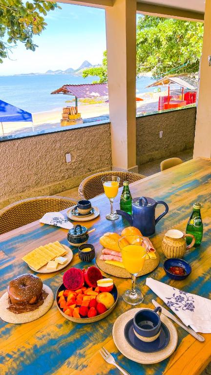 Joogid majutusasutuses Casa com pes na areia em Iriri - ES