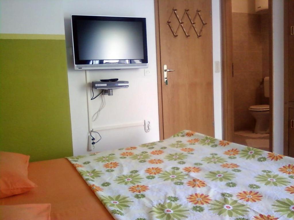 TV a/nebo společenská místnost v ubytování rooms & studio 4you
