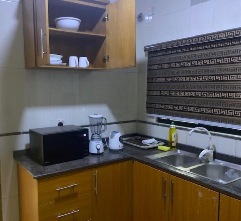 Kuchyň nebo kuchyňský kout v ubytování Rehoboth Homes