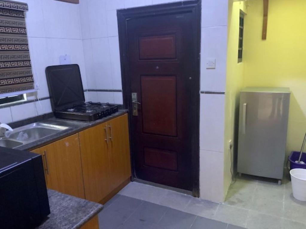 Kuchyň nebo kuchyňský kout v ubytování Rehoboth Homes