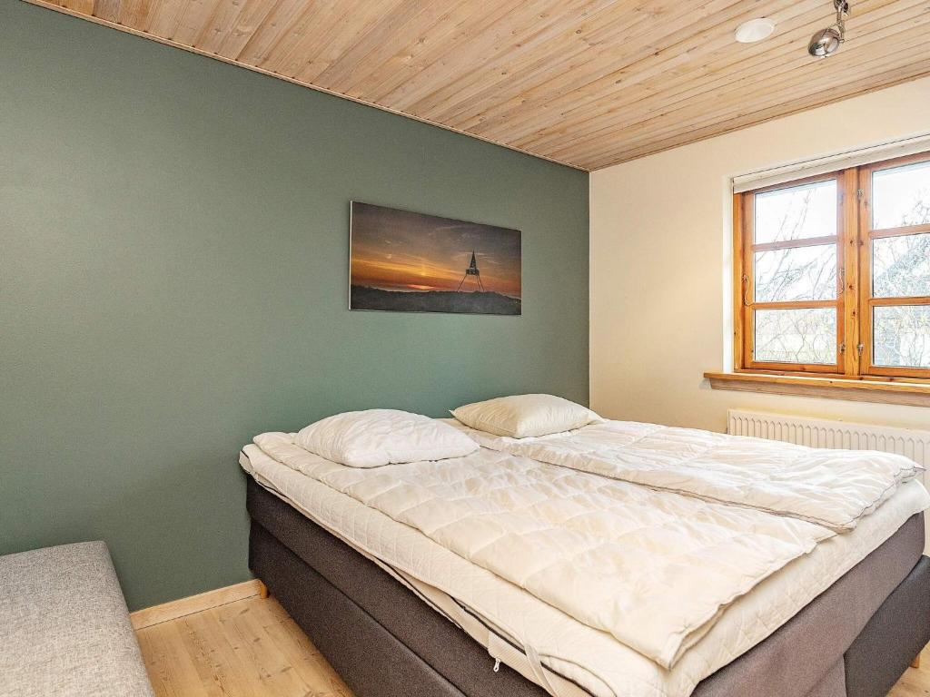 Postel nebo postele na pokoji v ubytování 10 person holiday home in Skagen