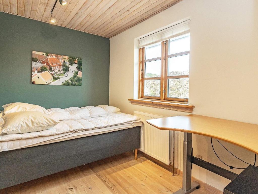 Postel nebo postele na pokoji v ubytování 10 person holiday home in Skagen