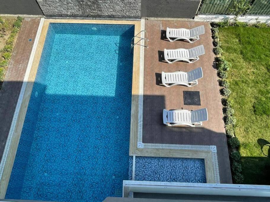 Výhled na bazén z ubytování Sleeps 10, Private Pool Villa with Playground - AWZ 259 nebo okolí