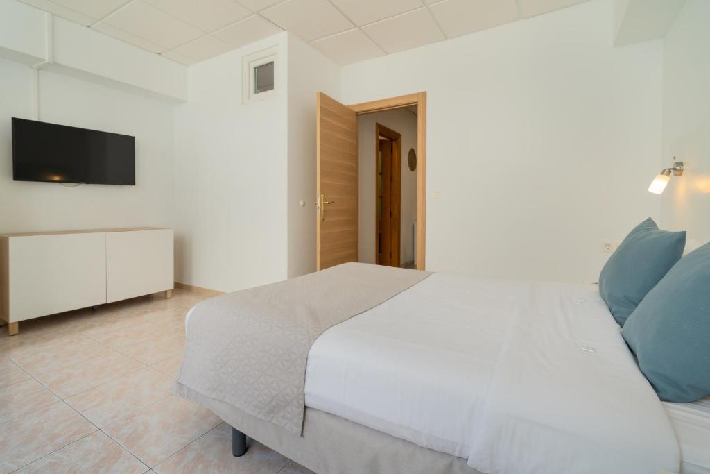 Postel nebo postele na pokoji v ubytování Sabbia Suites Arrecifeando