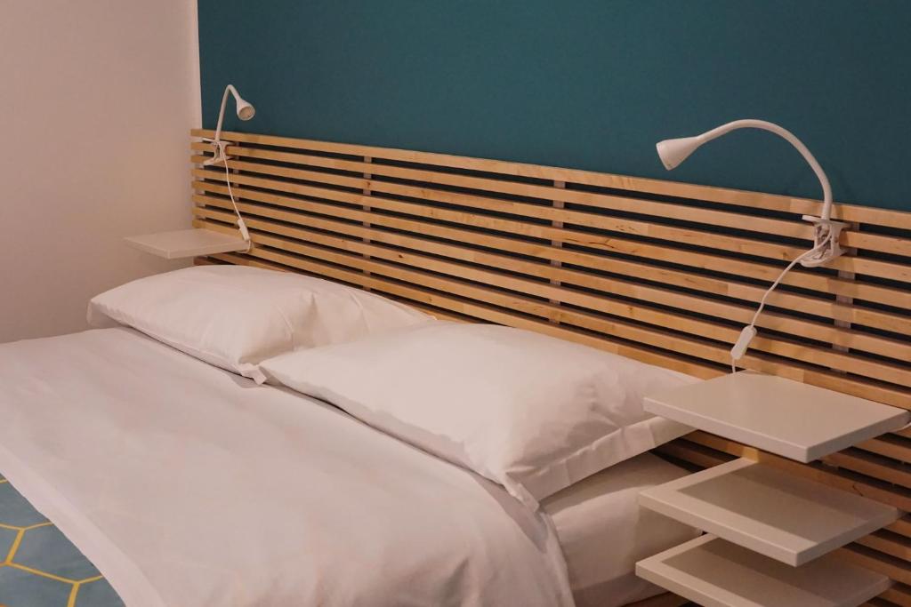 A bed or beds in a room at Roma Trasteverina