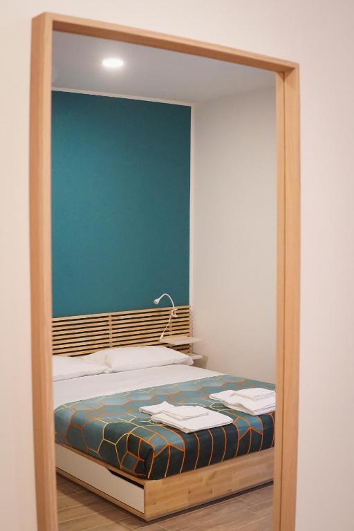 A bed or beds in a room at Roma Trasteverina