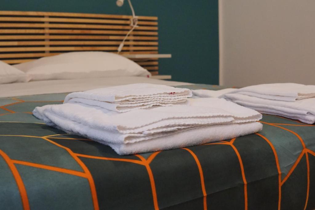 A bed or beds in a room at Roma Trasteverina