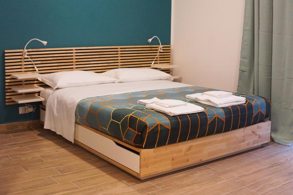 A bed or beds in a room at Roma Trasteverina