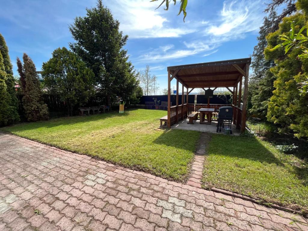 Zahrada ubytování SunSet Beach Apartman