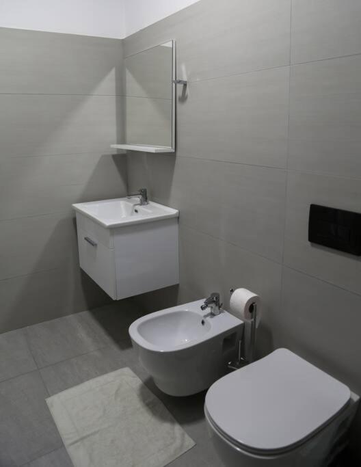 Koupelna v ubytování AMMEN Apartment
