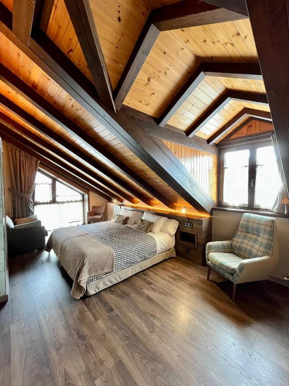 Postel nebo postele na pokoji v ubytování Hotel Boutique La Neu
