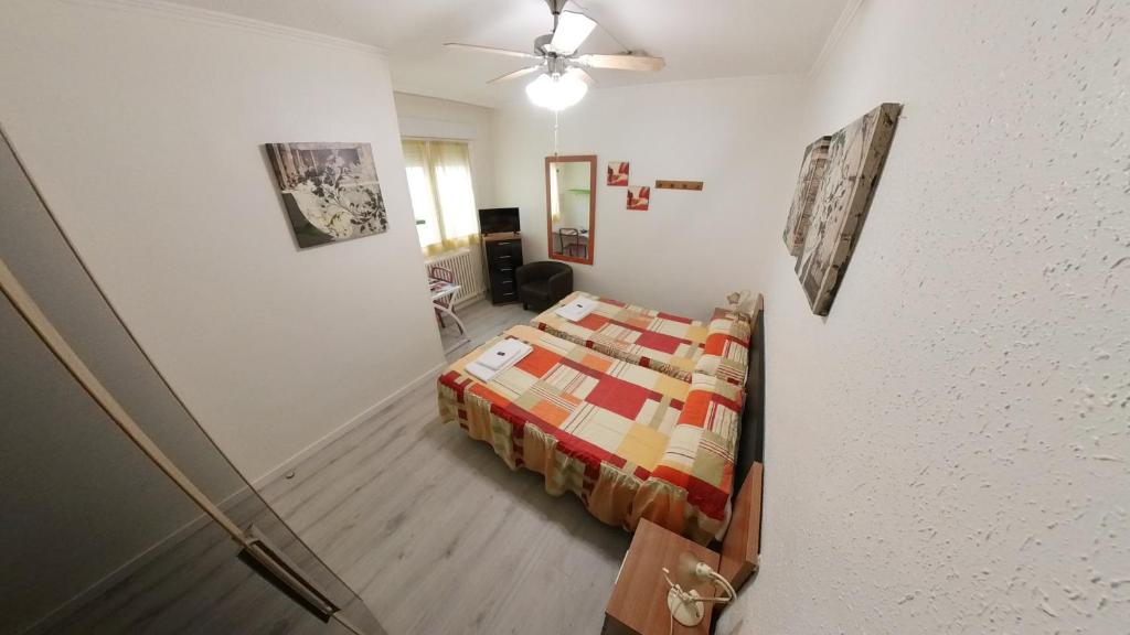 Postel nebo postele na pokoji v ubytování Pensión Pamplonabeds