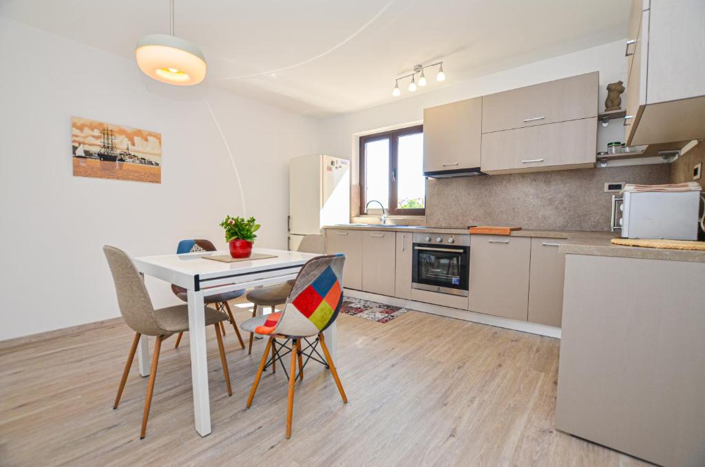 Kuchyň nebo kuchyňský kout v ubytování Apartments Palma