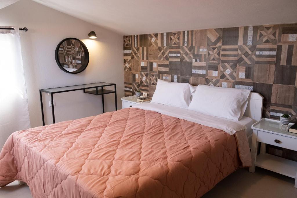 Postel nebo postele na pokoji v ubytování Miramare Apartments