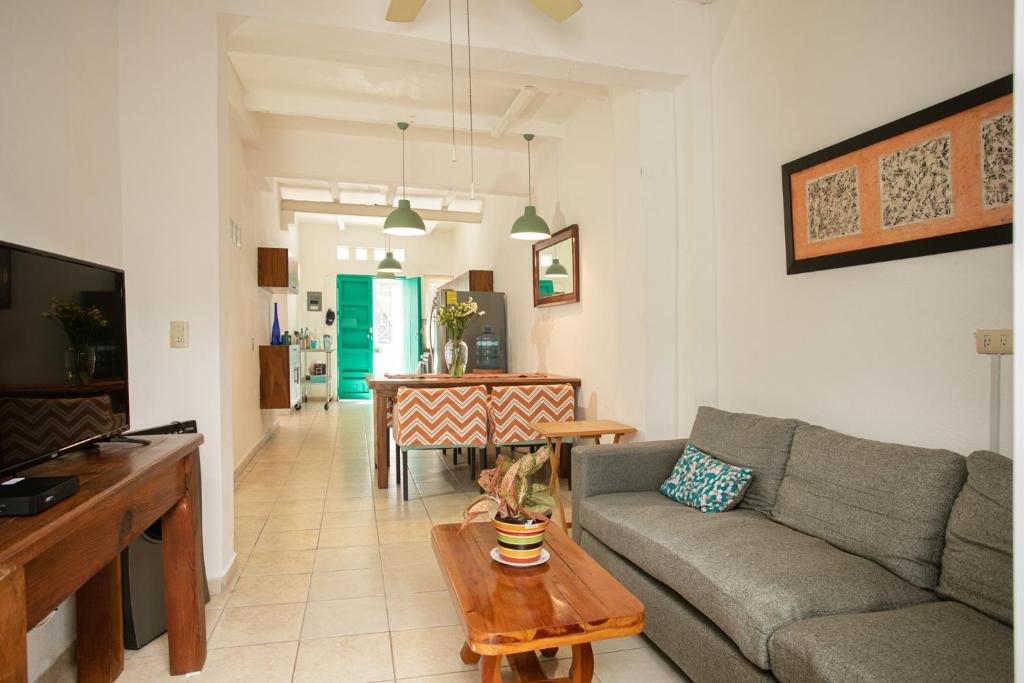 a living room with a couch and a table at Casitas Miramar Puerto Vallarta Malecón in Puerto Vallarta