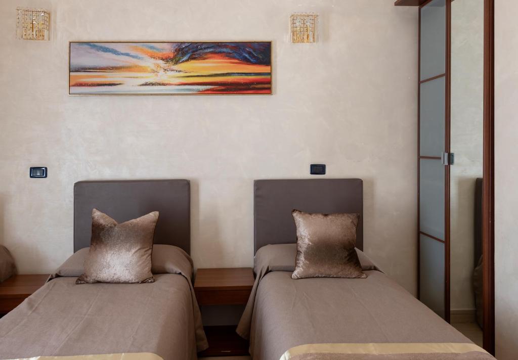 Posteľ alebo postele v izbe v ubytovaní New Joyful Guest House