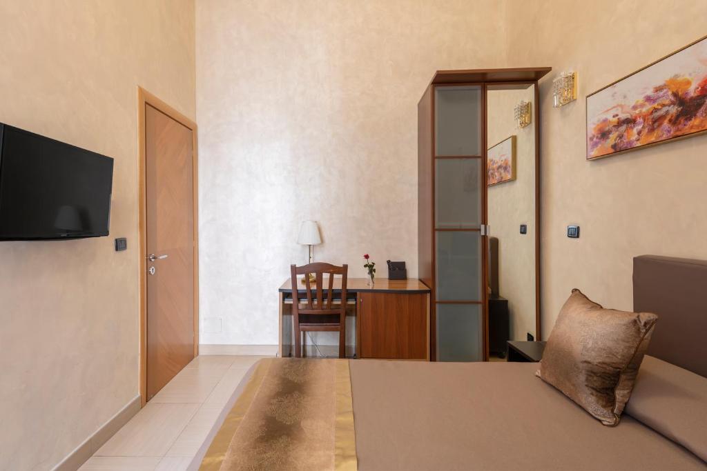 Televízia a/alebo spoločenská miestnosť v ubytovaní New Joyful Guest House