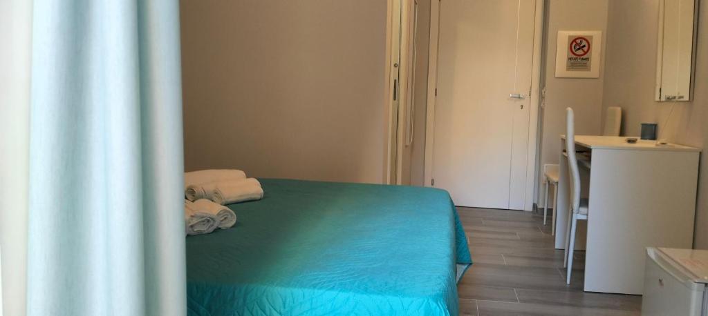 Postel nebo postele na pokoji v ubytování Le vie del centro