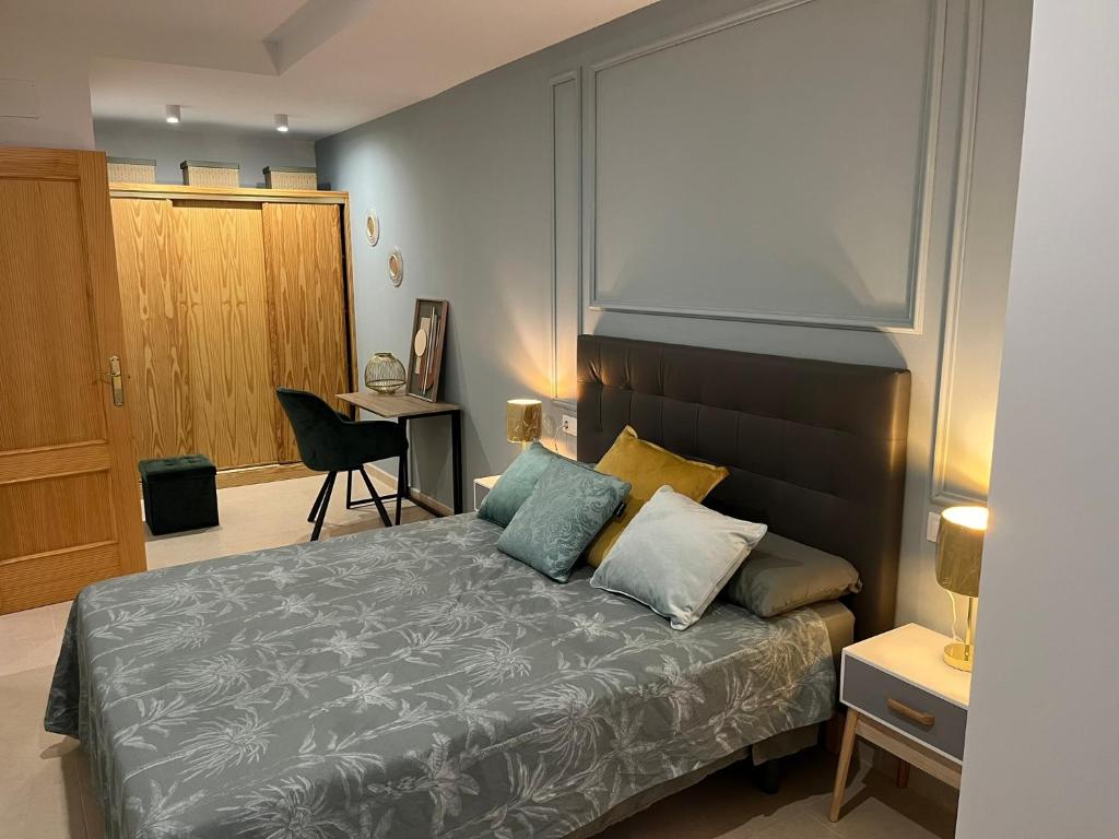 Ένα ή περισσότερα κρεβάτια σε δωμάτιο στο LUXURY CENTER II