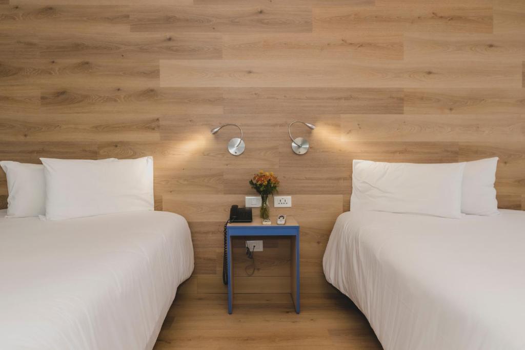 Postel nebo postele na pokoji v ubytování ARTE HOTEL Lima
