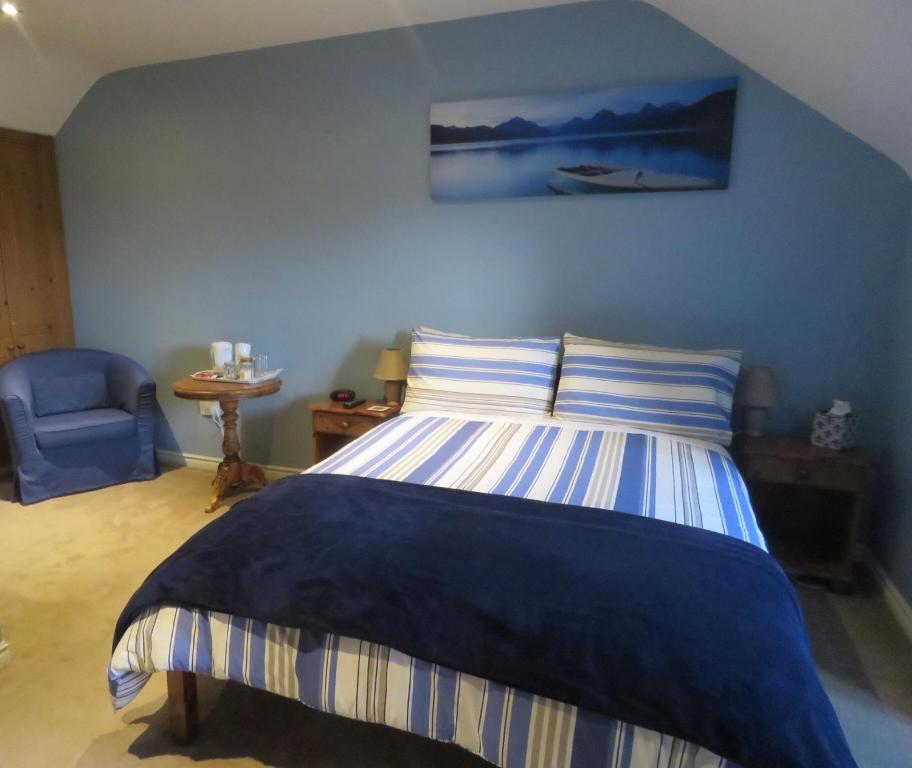 Postel nebo postele na pokoji v ubytování Greenside B&B
