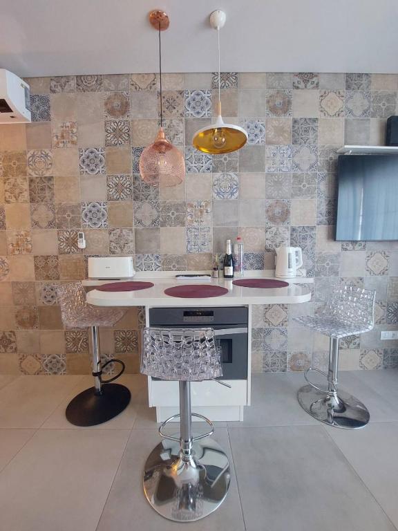Kuchyňa alebo kuchynka v ubytovaní ORLANDO LUXURY APARTAMENT