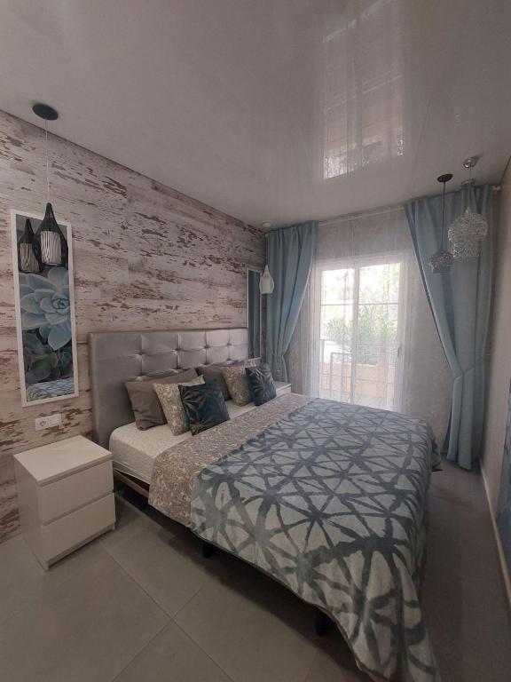 Posteľ alebo postele v izbe v ubytovaní ORLANDO LUXURY APARTAMENT