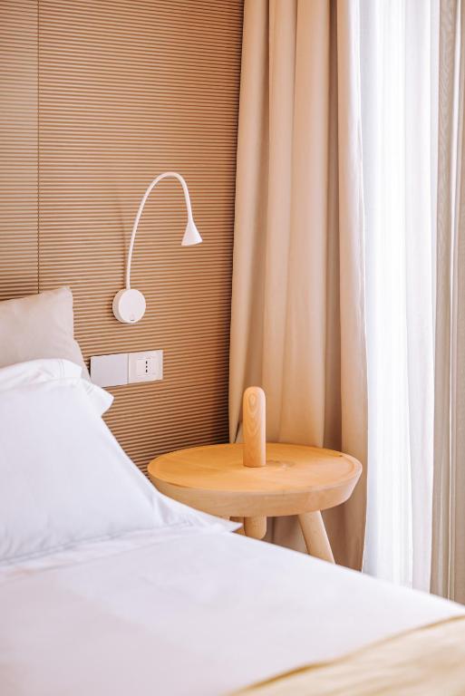 Postel nebo postele na pokoji v ubytování Biancodonda Greenblu Hotel & SPA