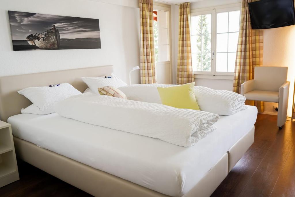 Postel nebo postele na pokoji v ubytování Seehotel Baumgarten