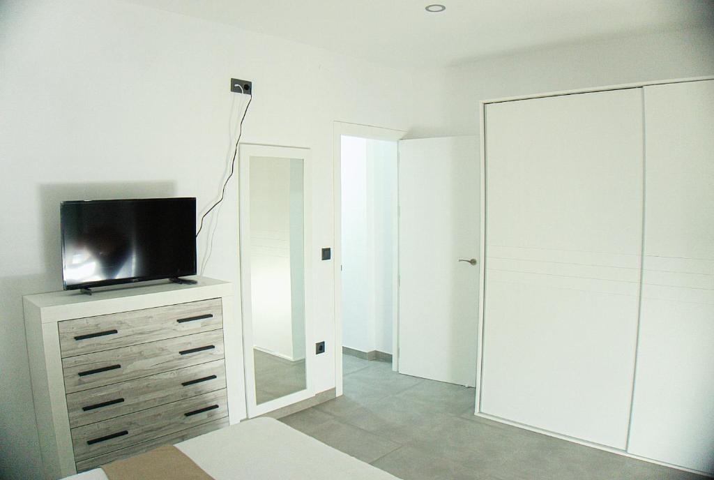 TV a/nebo společenská místnost v ubytování Apartamento Vistas de Doñana