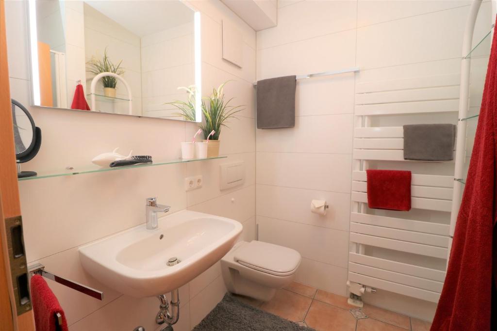 Koupelna v ubytování Wohnpark Strandstraße App 06