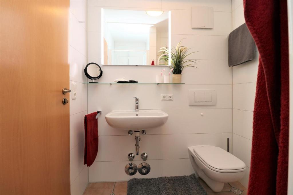 Koupelna v ubytování Wohnpark Strandstraße App 06