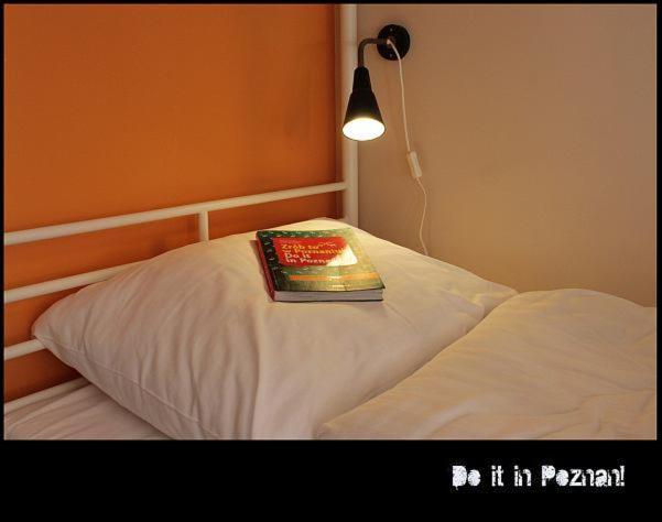 Posteľ alebo postele v izbe v ubytovaní La Guitarra Hostel Poznań