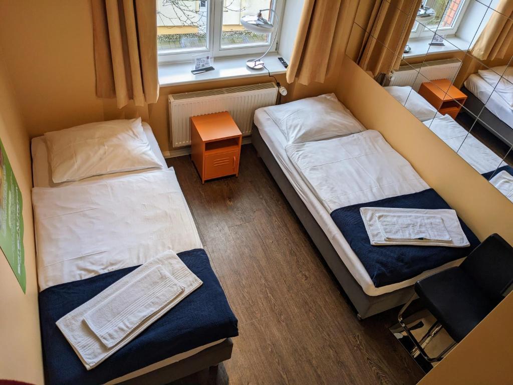 Postel nebo postele na pokoji v ubytování Postel Wolgast
