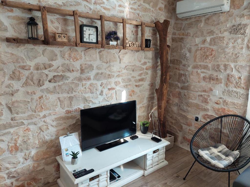 TV a/nebo společenská místnost v ubytování Šimun&Jakov