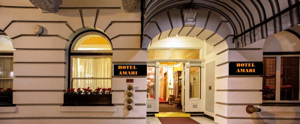 a hallway of a building with an entrance to a mall at Hotel Amari in San Francisco