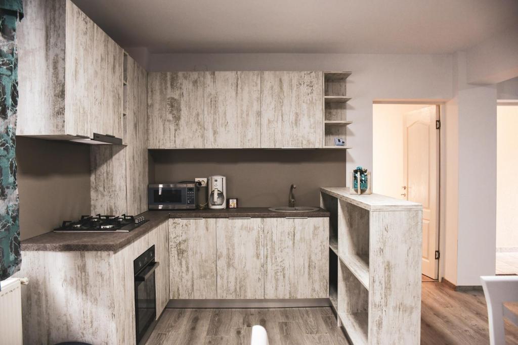 Kuchyň nebo kuchyňský kout v ubytování Casa Novis