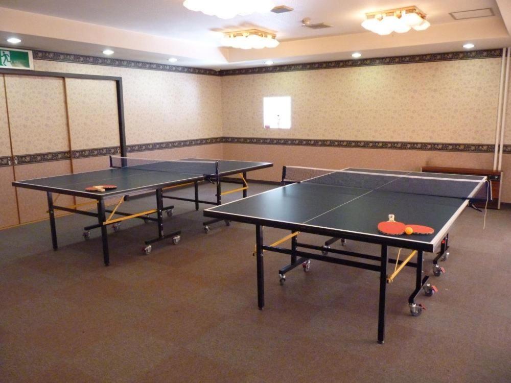 Stolní tenis v ubytování Kusatsu Skyland Hotel nebo okolí