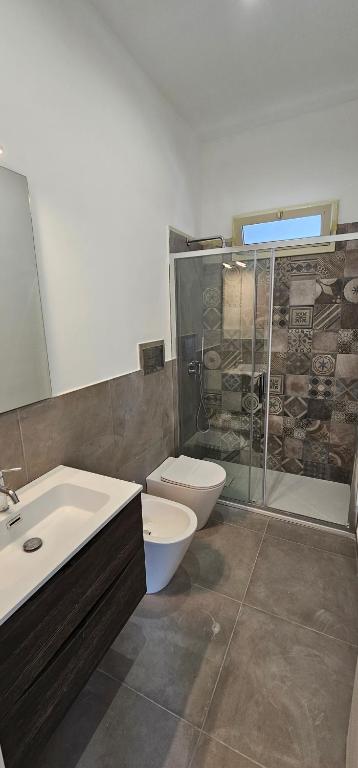 Koupelna v ubytování Villa Rita Apartament & Rooms