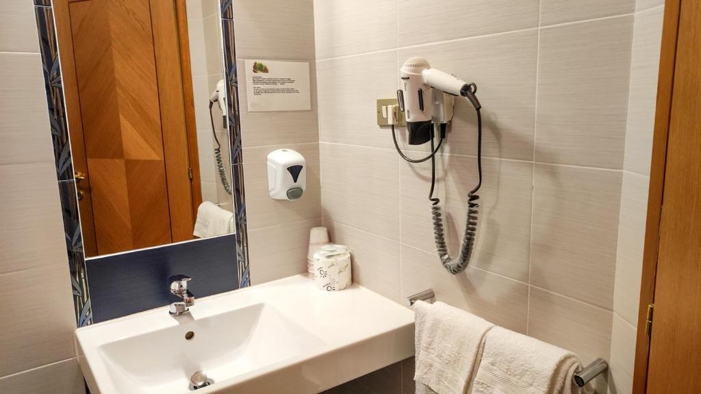 Koupelna v ubytování Hotel Edelweiss