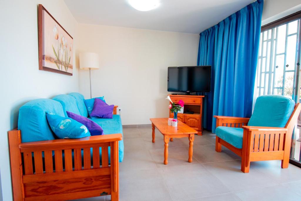 TV a/nebo společenská místnost v ubytování Apartamento en Las Flores I